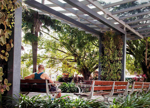 A lovely stage and harbour rests amongst the lush tropical foliage at the town hall green.