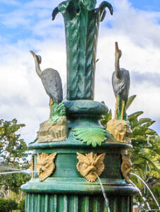 Cranes and griffins crown the historic Fairy Fountain in Queens Park.