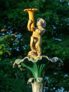 The Fairy Fountain’s cherub proudly holds his restored horn of plenty.