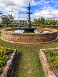 A garden walkway leads to the enchanting Fairy Fountain.