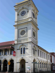 Maryborough Post Office clock tower with dual clock faces and heritage architectural features.
